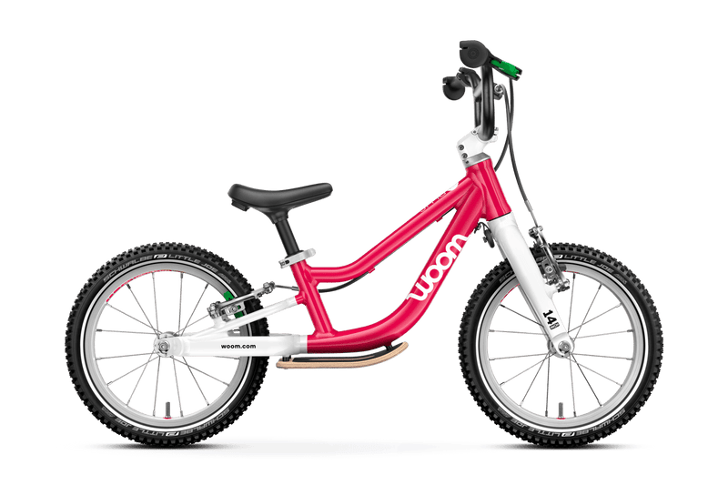 A pink Woom GO 1 PLUS Kids Balance Bike with 14-inch wheels, designed for children aged 3 and up.